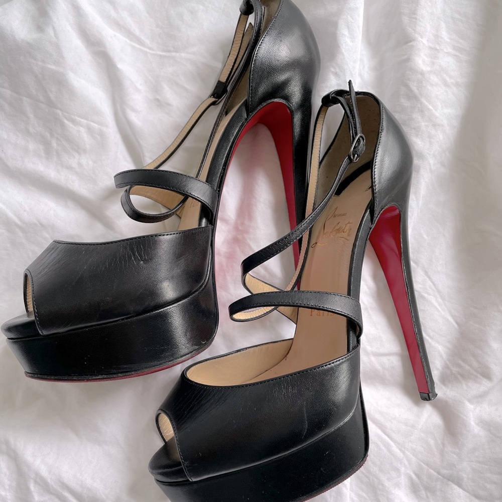 Christian Louboutin red bottom peep toe stilettos
